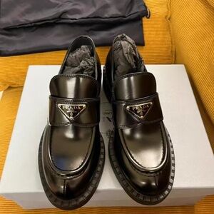 Prada Women's Black Glossy Slip-On Loafers